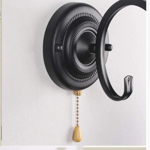 Pull Chain Lantern Wall Sconce With Metal Frame And Transparent Glass Shade, Old School Rustic Vibe, black metal base detail