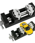 Dual Jaw Mini Vise Clamp With Fractal Jaw That Auto Adapts to Irregular Shapes for Mad DIY Projects, holding a small yellow model car.