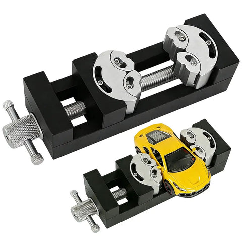 Dual Jaw Mini Vise Clamp With Fractal Jaw That Auto Adapts to Irregular Shapes for Mad DIY Projects, holding a small yellow model car.