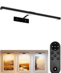 Slick Wireless Picture Light Featuring A Solid 4800mAh Battery And Strong Magnetic Mount With Ir Remote, illuminating three art frames.
