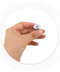 Hand holding a hex wheel axle nut from the Beefed Up Heavy Duty Bicycle Wheel Axle Nut Kit With Carbon Steel Nuts And Anti Rotation Tab Washers For Mountain And Road Bikes Secure Retention Hardware To Prevent Loosening During Rough Rides