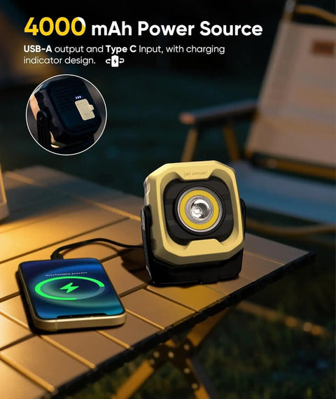 Magnetic Work Light Two Pack With IPX4 Waterproof, 4000mAh Battery, shown charging a phone on a table outdoors