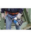 Person holding Super Lightweight Portable Magnetic Drill Press By CS Unitec MAB 100 K Compact Cordless Unit weighing 21.8 lbs.