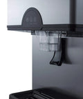 Smooth Operator Commercial Countertop Ice And Water Dispenser Yielding 282 Pounds Of Crisp Nugget Ice Daily With Eleven Pound Storage Plus Built In Filter Cartridge For Fast Paced Break Rooms And Clinic Waiting Areas, featuring dispensing area and controls.