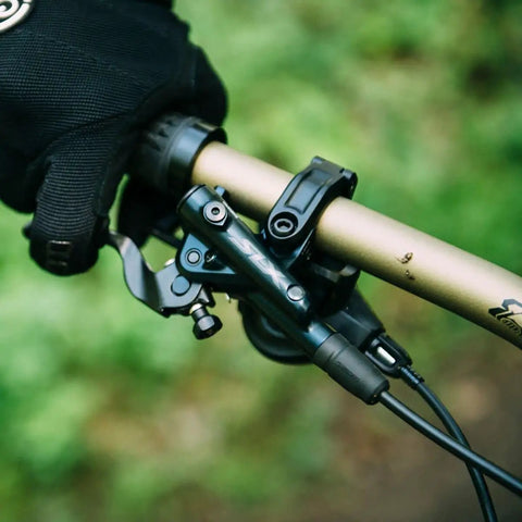 M7100 SLX Hydraulic Disc Brake Left Front Post Mount 2 Piston Caliper on mountain bike handlebar
