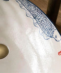 Close-up of USZWBY Vessel Vanity Sink Basin Hand Painted Wash Basin showing design, drain, and glossy finish for bathroom use.