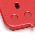 Close-up of red semi-metallic disc brake pad corner from Eight Pack SemiMetallic Disc Brake Pads For Mountain And Electric Bikes Durable