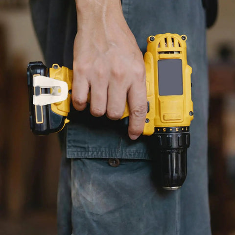 Heavy Duty Steel Belt Clip Hooks For Drill Drivers With Screws Rugged Tool Belt Clips For Secure On Site Tool Carry Rust Resistant Durable Replacement Clips That Stand Up To Tough Worksites, drill held at side