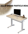 Top Tier Ergonomic Standing Desk With Smooth Crank Lift And Secure Drawer, solid wood particle board, 120x60cm, compact design.