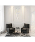 Modern 13 Light Crystal And Metal Pendant Ceiling Fixture In Sleek Chrome Finish For Fresh Home Vibes And Dope Indoor Ambiance Slick Living Room Chandelier Decor above stylish gray chairs.
