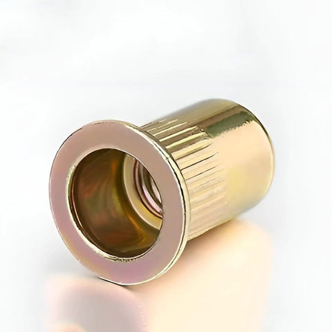 Close-up of a zinc-plated carbon steel rivet nut with flat head from 220 Pcs Metric Rivet Nut Kit Zinc Plated Carbon Steel Flat Head Rivnut Assortment Knurled Body Threaded Insert Nuts For Automotive Repairs DIY Friendly Pro Grade Heavy Duty Pro Repair Kit.
