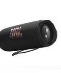 Flip 6 Portable Bluetooth Speaker With Loud Power And Deep Bass, IPX7 Waterproof, 12 Hour Playtime shown in black color.