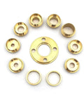 Solid As A Rock Metric Brass Router Guide Bushing Set showing eight brass guide rings and a central bushing for template tracking.