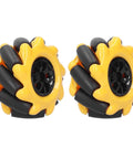 Two yellow 48mm mecanum wheels with black rollers for omnidirectional robot projects