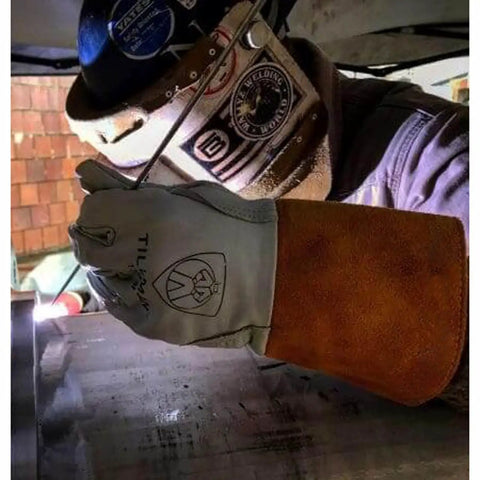Unisex X Large Tig Welding Gloves With Pearl Top Grain Goatskin on welder using TIG torch, brown leather cuff