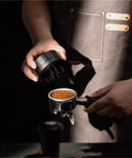 Professional Espresso Coffee Distribution Needle And Grounds Stirrer Tool in use over portafilter with coffee grounds for 51mm 54mm 58mm.