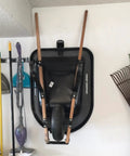 Heavy Duty Wheelbarrow Storage Bracket With Wall Mount Black Sturdy 80 Lb Capacity holding wheelbarrow in garage