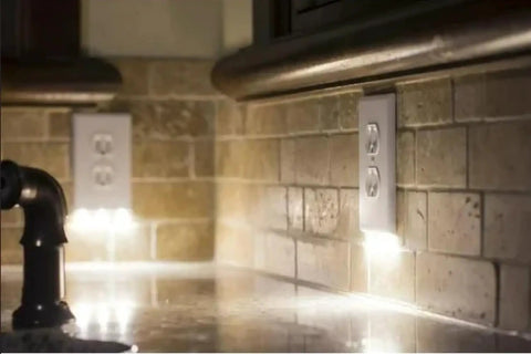 Two Pack Wall Plate Night Lights LED Built Into Outlet Plates Duplex White Auto On Off No Batteries No Brackets lighted counter view