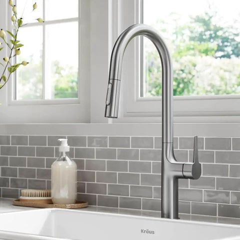 Oletto Tall Modern Pull Down Kitchen Faucet With Single Handle Spot Free Stainless Steel Finish in a stylish kitchen setting