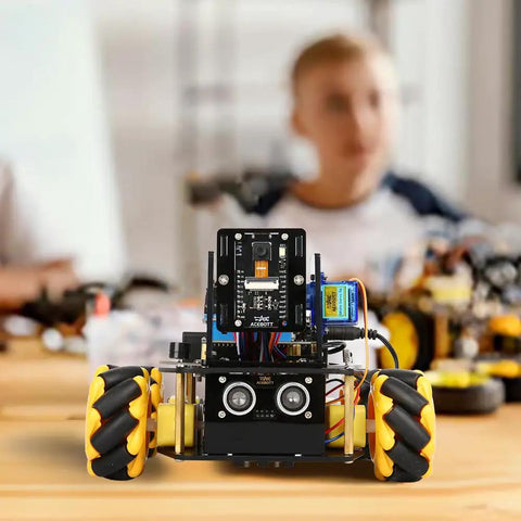 Kid Friendly 3MP Camera STEM Robot Kit With App And Remote Control For Ages 8 To 16 on wooden table