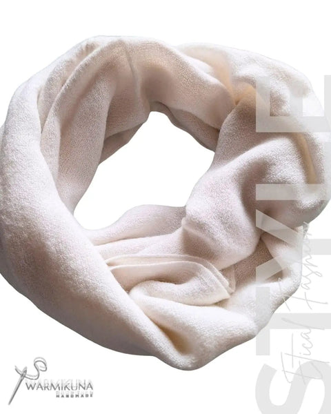 Ultra Cozy Winter Cashmere Infinity Scarf In Beige, plush soft knit wrap, modern design, shown in a loop style
