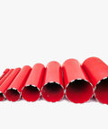 Diamond core drill bit set, eight red concrete bits with segmented edges, varying diameters.