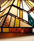 Close-up of Tiffany Style Pendant Light 12 Inch Wide Amber Cream Stained Glass Shade With Adjustable Chain Hanging Lamp