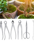 Garden Cutting Tools Set 6 Piece Stainless Steel Bud Scissors And Wire Pliers With Storage Bag For Bonsai Fruit Tree Pruning Leaf Trimming And Garden Maintenance, six tools laid out