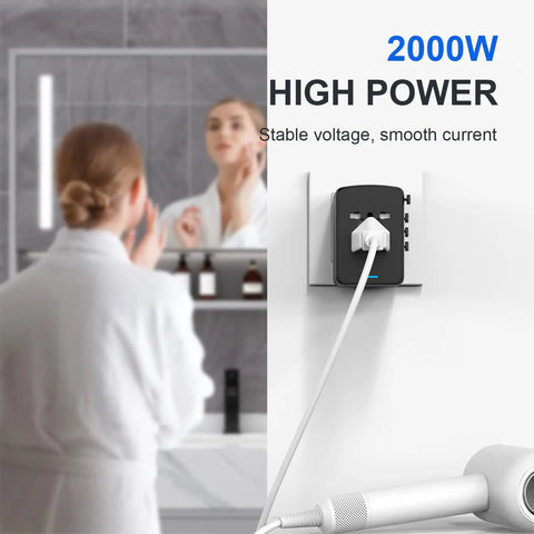 Fast 35W PD USB C Travel Adapter With 2 USB C And 3 USB A Ports in use in a bathroom, powering a hair dryer at 2000W
