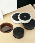 Slick 18 Pc Desk Wire Grommet Kit With Tough Abs And Rubber Rings For Organizing Cables Under Office Tables And Keeping Workspaces Super Clean And Cable Safe, black and white desk grommets on wood tabletop