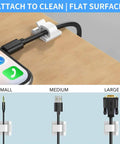 Cable clip holding black cable on desk, sizes shown for upgraded 50 pack cable clips with strong adhesive tapes for wire clips and cord organizer.
