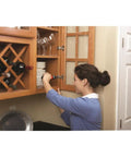 Woman using Cordless Screwdriver With Forward And Reverse Switch, Manual Screw Driving Option, AA Battery Powered, in kitchen