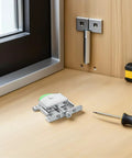 Heavy Duty Sliding Door Roller Kit For Wardrobe And Closet Repair Featuring Steel Frame With Nylon Reinforced Fiber Wheels High Load Bearing And Wear Resistant Design Prevents Squeak Forever Make Doors Roll Smooth Like Butter Every Single Day. metal roller part on wooden surface beside screwdriver