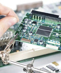 Hand soldering electronic circuit board with Sixty Forty Rosin Core Solder Wire 0.6mm tin lead for electronics repairs.