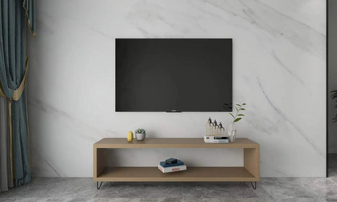 Living room setup with a TV stand featuring 10 Inch Trapezoid Hairpin Furniture Legs Set Of 4, Solid Cold Rolled Steel, Black Finish.