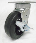 Pro Grade Swivel Caster With Kingpinless Build And Trusty Top Lock Brake Housing A Bombproof Six Inch Rubber Wheel On A Steel Hub Handling Five Fifty Pounds Built Damn Tough For Tool Boxes And Mobile Carts, single rubber caster with brake and steel hub.