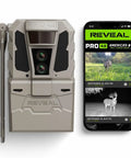 Top Shelf Cellular Trail Camera With 4K Ultra HD Night Vision And Waterproof Build For Serious Hunters And Trail Crew Featuring Extended Battery Life And Dual Image Sensors next to smartphone displaying captured images.