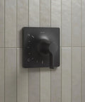 Front view of Venza Rite-Temp Bath And Shower Trim Kit With Matte Black Finish for 1.75 GPM faucets on tiled wall