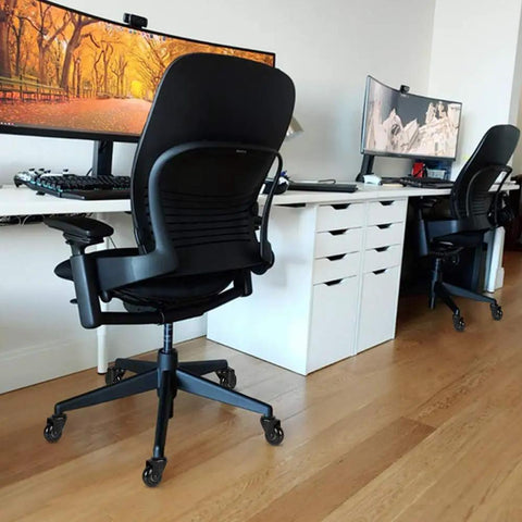 Heavy Duty Office Chair Caster Wheels With Threaded Stem Three Eighths 16X1 on black office chair in modern workspace.