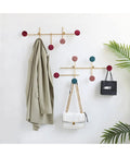 Slick Wall Mounted Coat Rack With Heavy Duty Adhesive Hooks And Key Holder For Mudroom Setup Easy Peel Design with coats and bags.