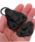 Hand holding part of Eight Piece Retro Duckbilled Hasp Lock Set For Luggage And Antique Boxes Spring Lock Metal Clasp With Quick Release Buckle Rugged Hardware Built To Last.