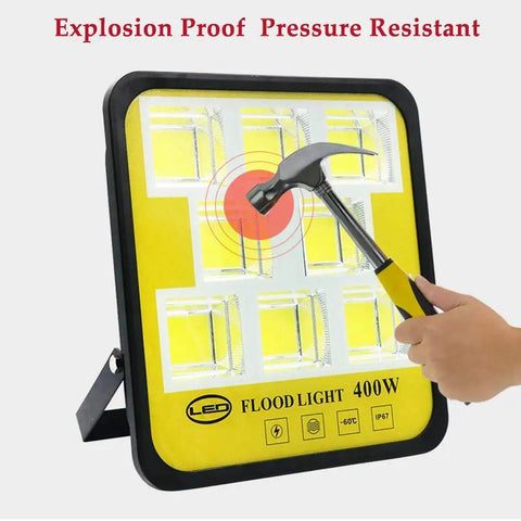 Knockout Brightness Rechargeable Led Work Light With Solar Charging And Remote Control Waterproof Portable Floodlight being hit by a hammer