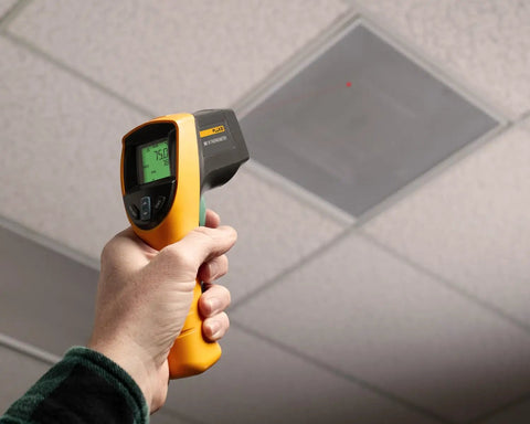 Boss Level HVAC Pro Infrared Thermometer With Dual Infrared And Thermocouple Modes, Reads Minus Forty To One Thousand Twenty Two Degrees Fahrenheit (Forty To Five Hundred Fifty Celsius), Perfect For HVAC And Refrigeration, Electrical, And Industrial Work handheld infrared thermometer aiming at ceiling tile