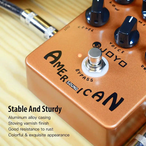 Golden-orange American Tube Amp Simulator And Preamp Guitar Pedal With Built In Cab Sim 6 Knob Tone Control on wood surface