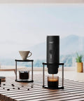 Proven Travel Espresso Stand And Universal Coffee Maker Rack With No Sweat Assembly For Drip Brewers And Portable Grinder Kits That Keeps Your Morning Brew Routine Fully Locked In, showcasing coffee maker and cups.