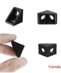 Close-up of black 2020 series aluminum extrusion corner bracket kit showing 20 right angle connectors for 20 series V slot profiles