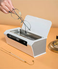 Top Shelf Mini Ultrasonic Cleaner Hella Crisp 500 ML Wash Bath for cleaning glasses with stainless steel basin and digital display.