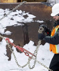 Worker using Winter Work Gloves With Waterproof Barrier And 100g PrimaLoft Gold Insulation Touchscreen Compatible in snowy job site.