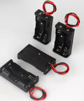 Four Pack Of Hella Reliable AA Battery Holders With Attached Leads And Stainless Steel Contacts For Effortless Power Delivery And A Straight Up No Fuss Housing That Keeps Batteries Securely Locked Away, featuring two holders and two leads.