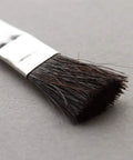 Close-up of Acid Resistant Glue Brush Set 6 Inch Metal Handle 12 Piece Heavy Duty Hard Bristle Brushes for applying glues.